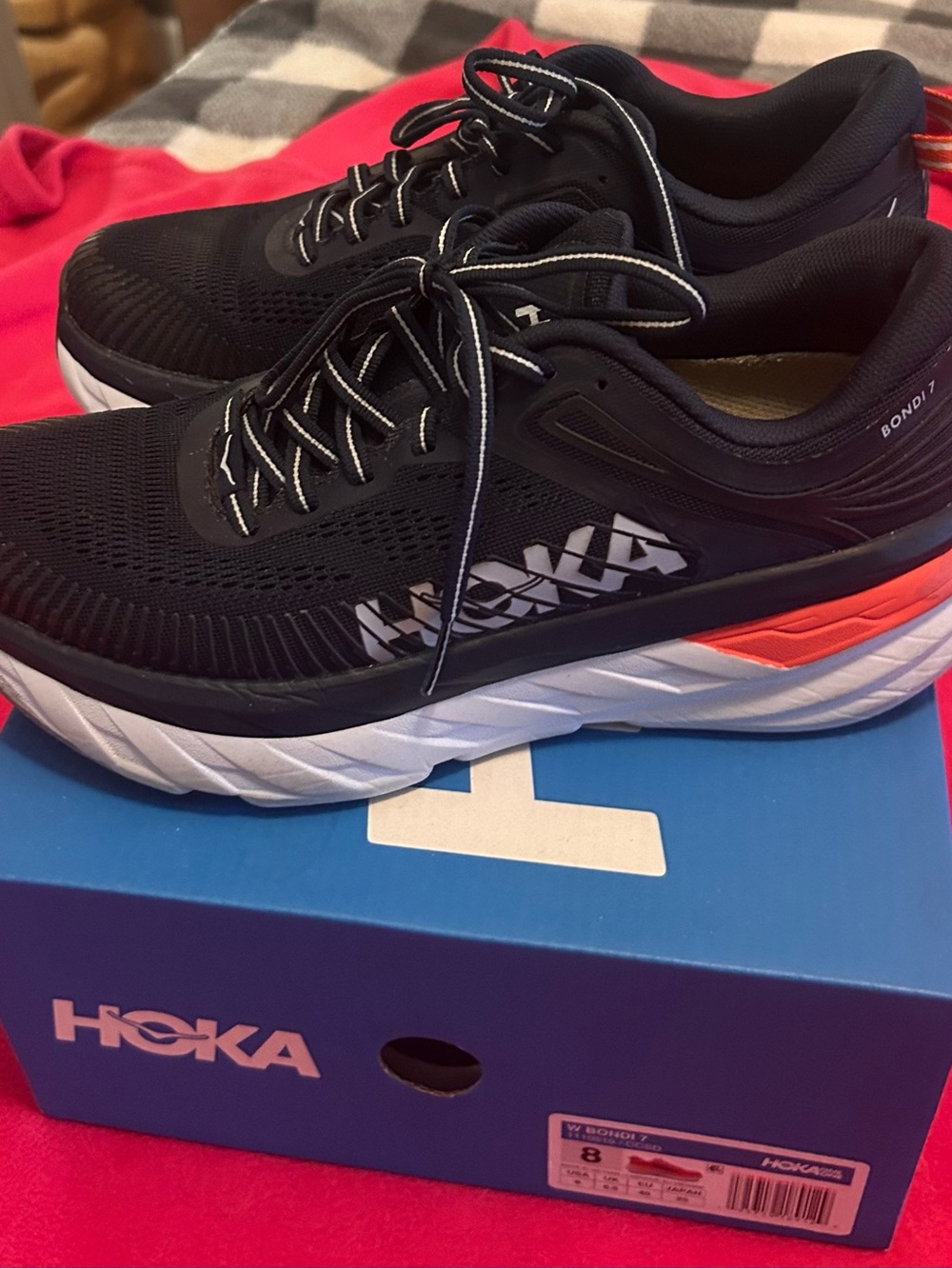Hoka women’s Bondi 7 Black with White and Orange Running Shoes - Picture 3 of 4